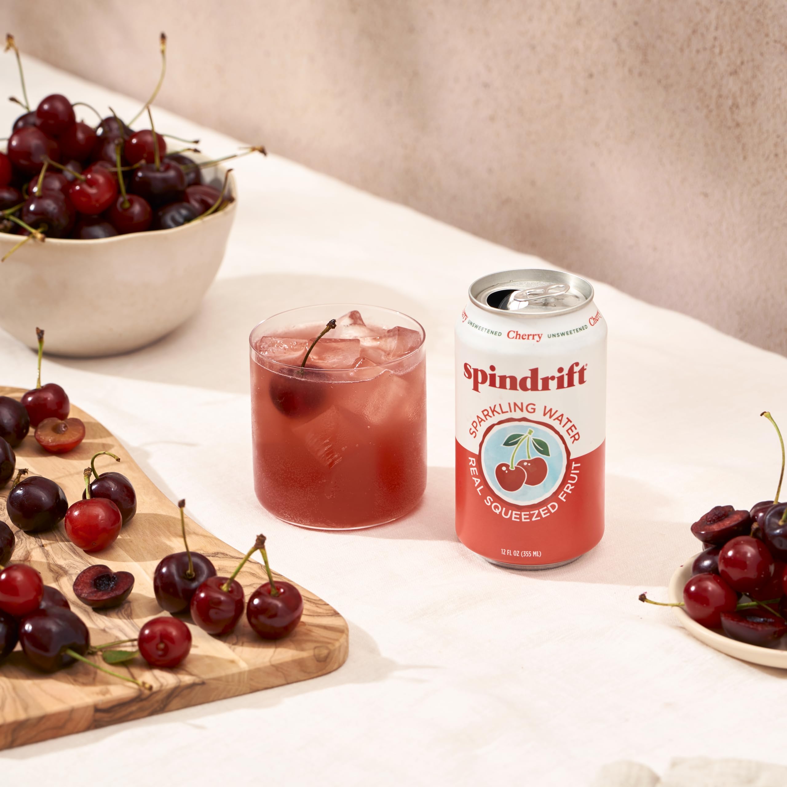 Spindrift Cherry fizz bubbles emphasizing natural taste without artificial sweeteners