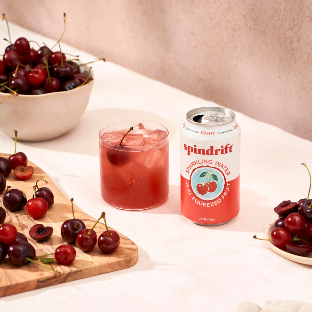 Spindrift Cherry fizz bubbles emphasizing natural taste without artificial sweeteners
