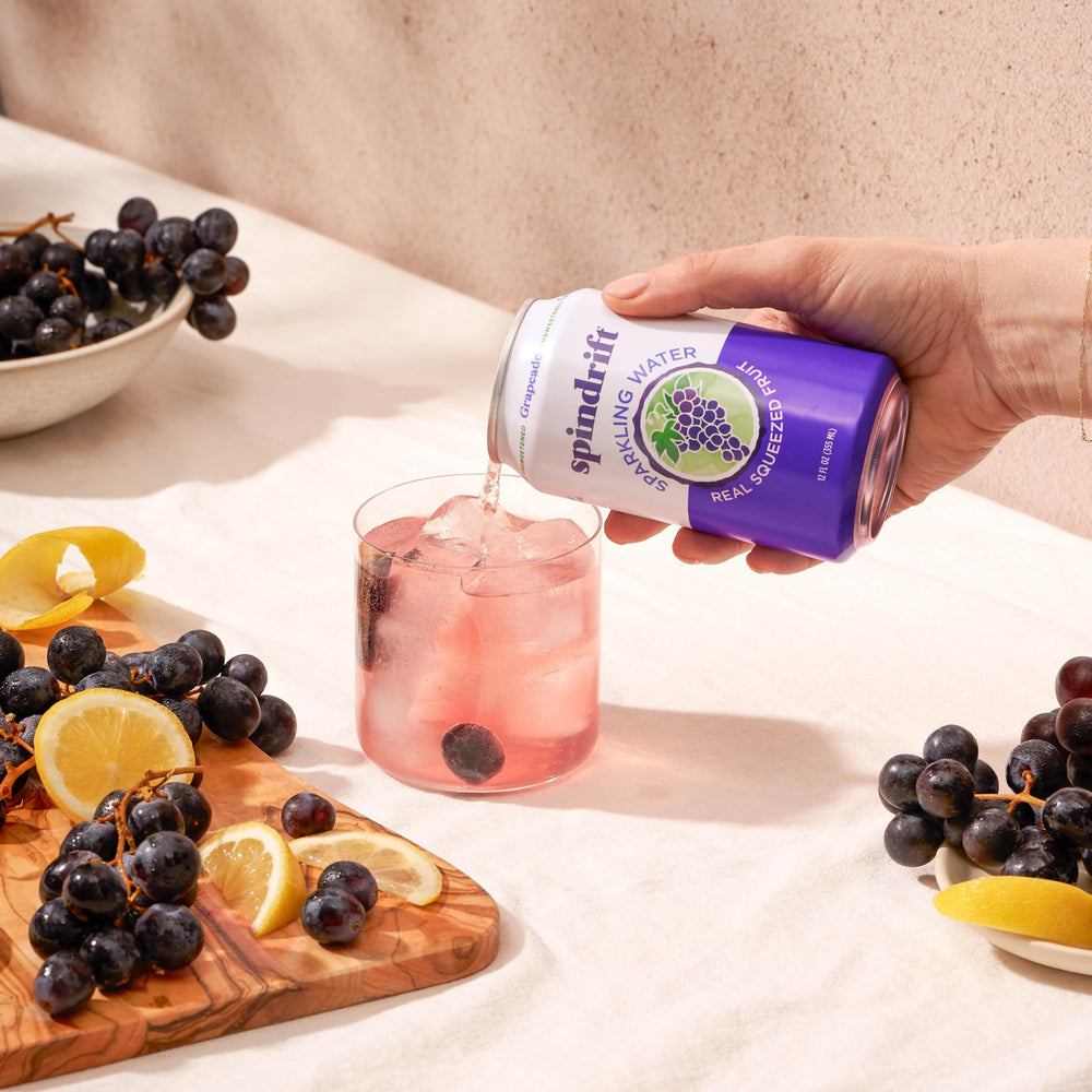 Spindrift Grapeade bubbles close-up emphasizes crisp, refreshing carbonation.