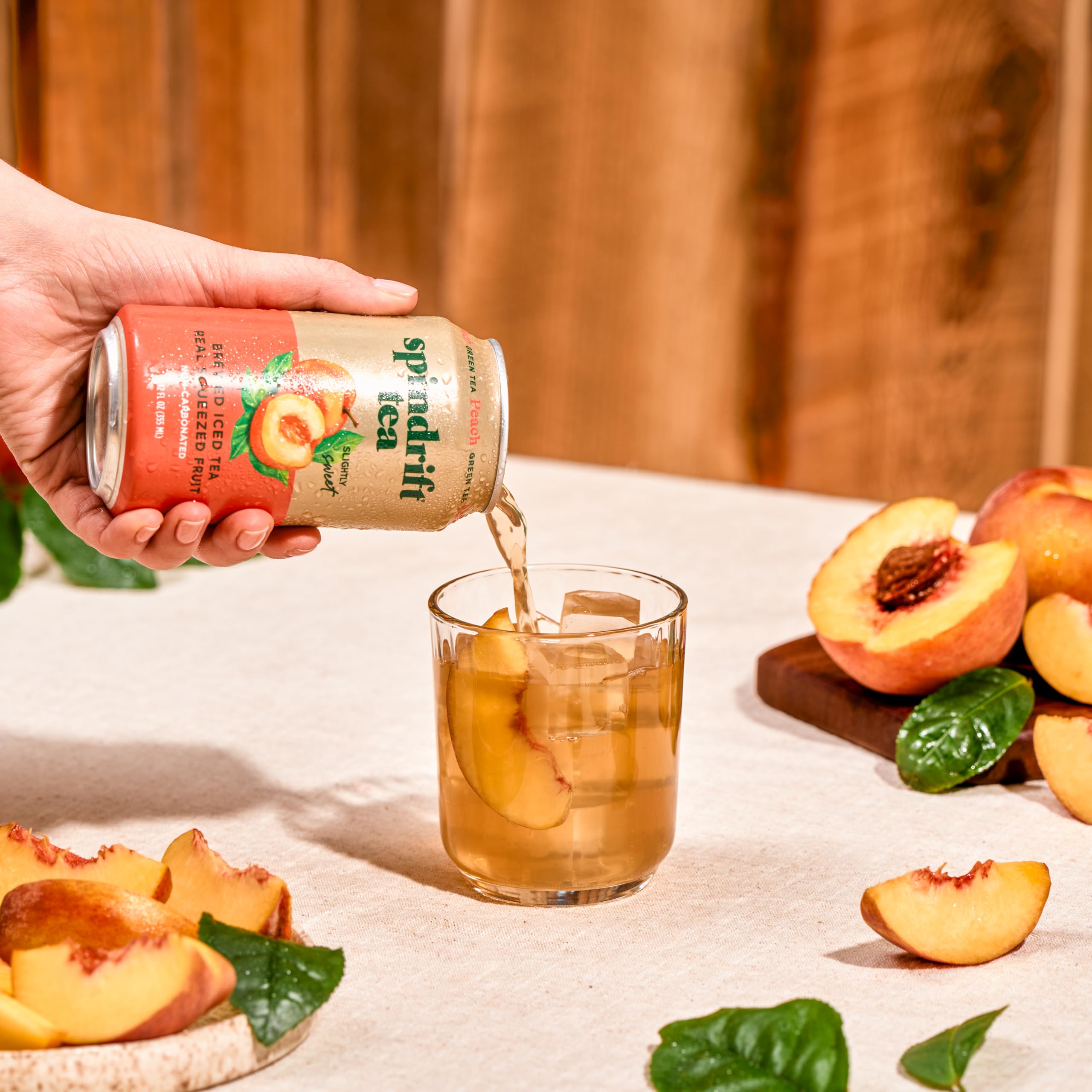 Serving idea: peach tea with a bright, refreshing presentation.