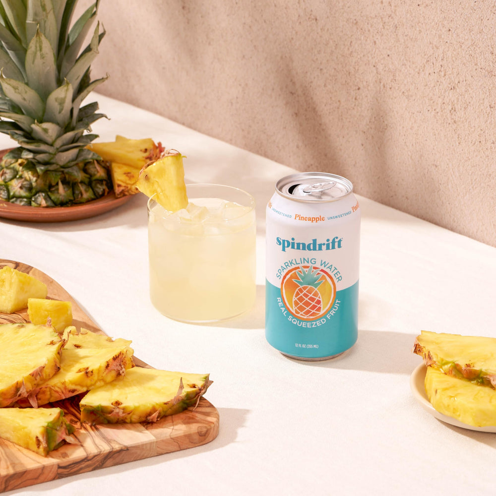 Glass with Spindrift Pineapple and ambient lighting for a tropical mood.