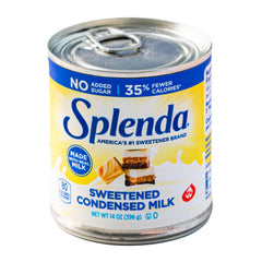 SPLENDA Reduced Calorie Condensed Milk can on a kitchen counter for low-calorie desserts.