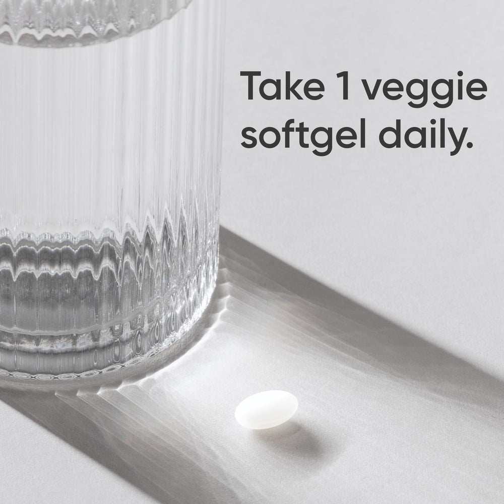 Close-up of the label showing vegan certification and non-GMO status.