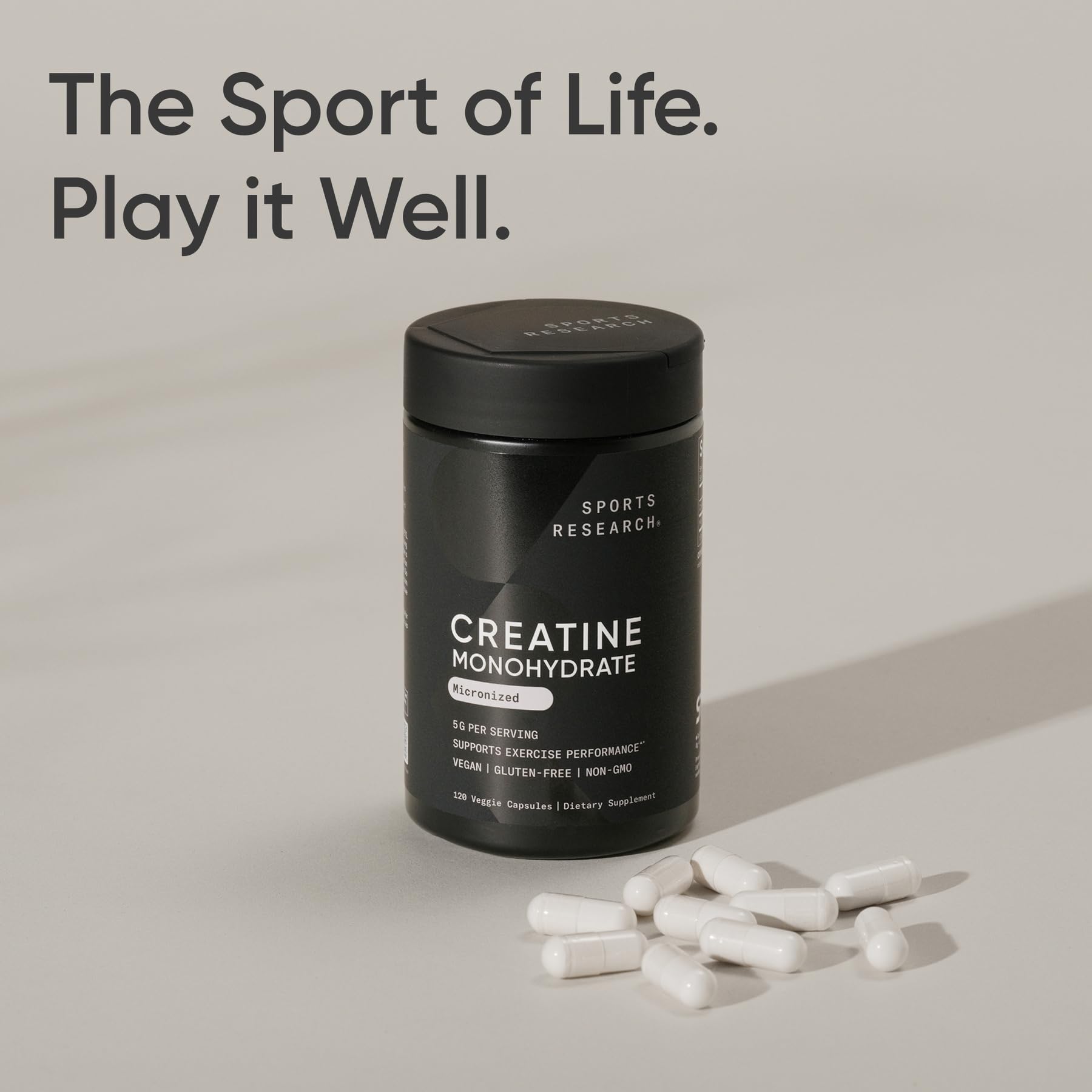 Vegan certified Sports Research creatine capsules displayed with clean ingredients.