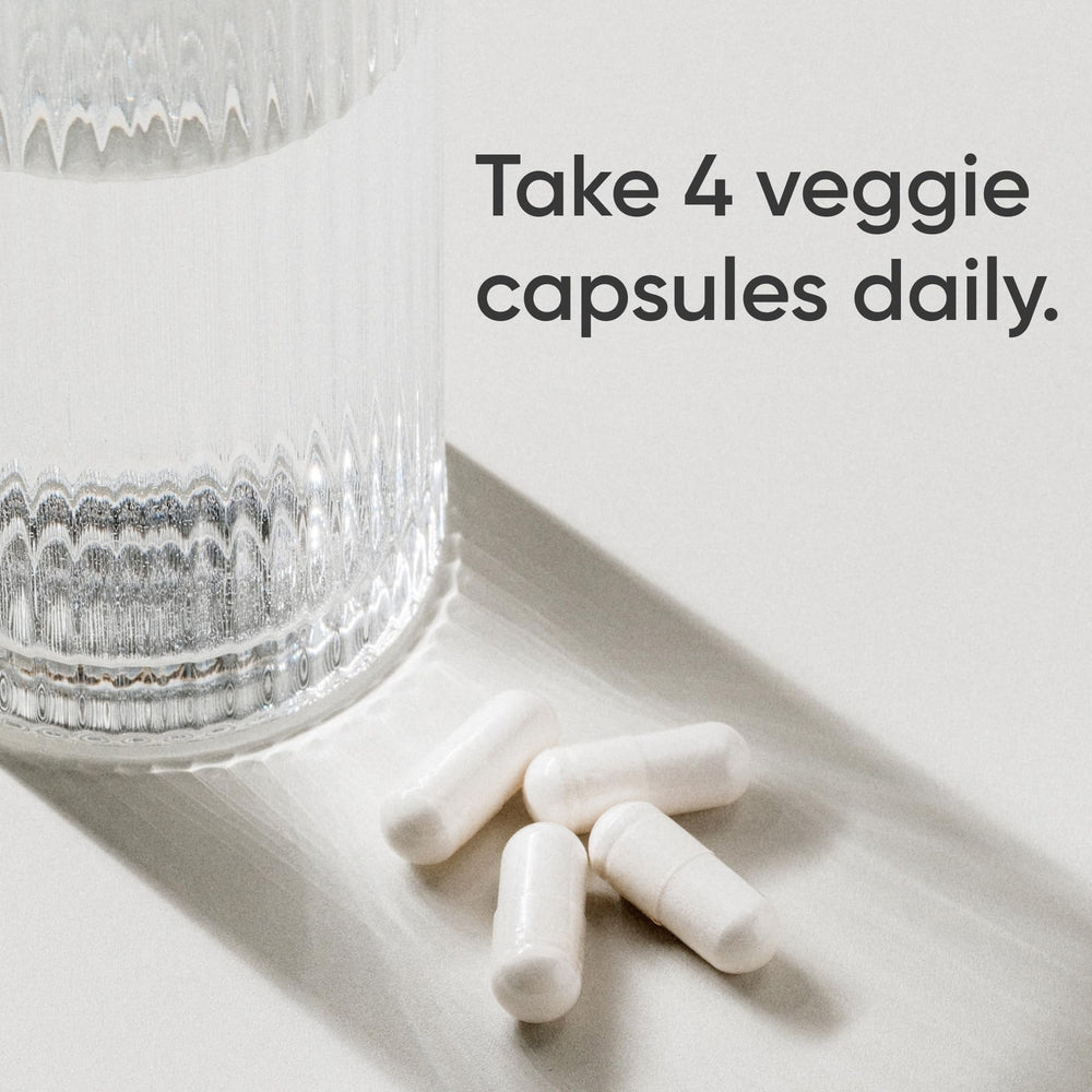Close-up of Sports Research label on creatine capsules highlighting purity.