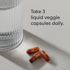 Sports Research Liposomal Vitamin C capsules close-up emphasizing enhanced absorption.