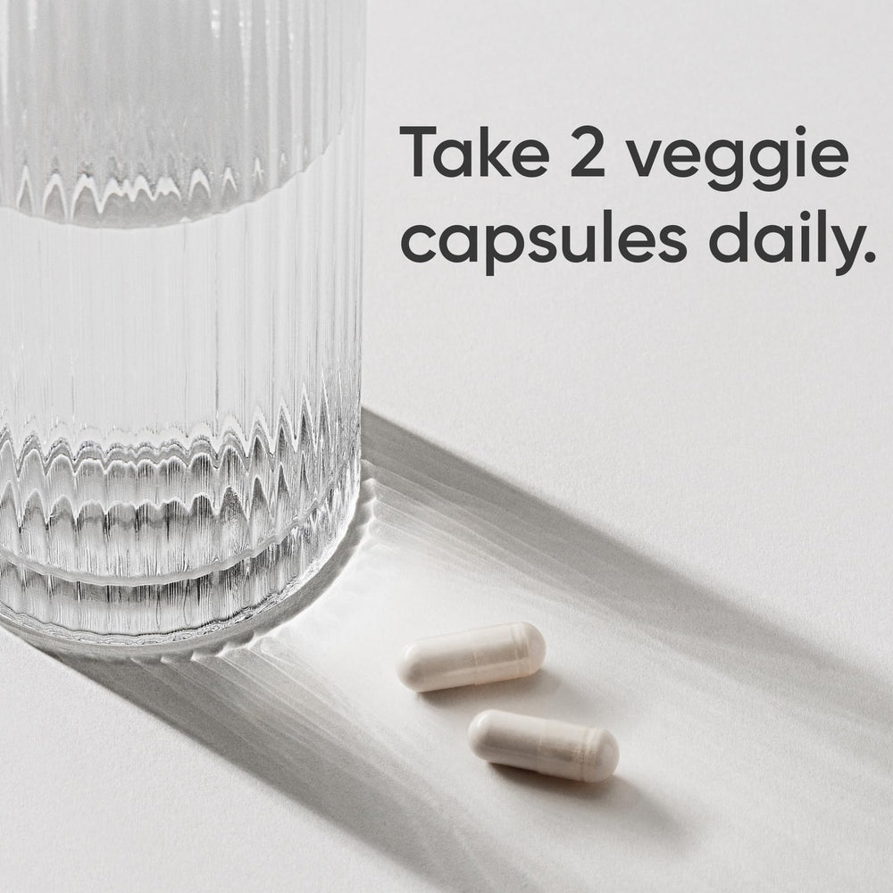Sports Research Magnesium Glycinate capsules close-up showing chelated magnesium.