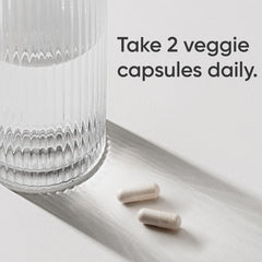 Sports Research Magnesium Glycinate capsules close-up showing chelated magnesium.