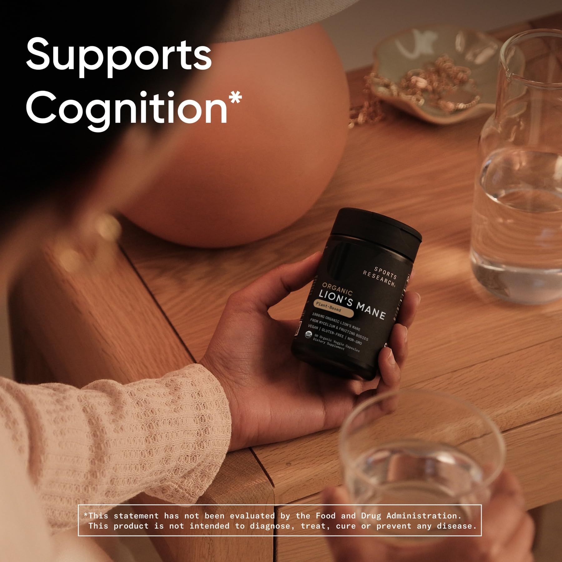 Sports Research Organic Lions Mane capsules on white surface – clean, easy to take supplement for busy days.