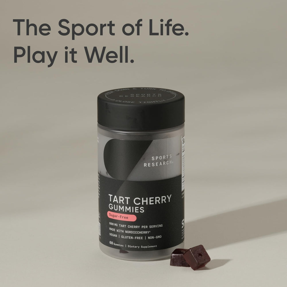 Sports Research Tart Cherry Gummies soft texture close-up in hand.