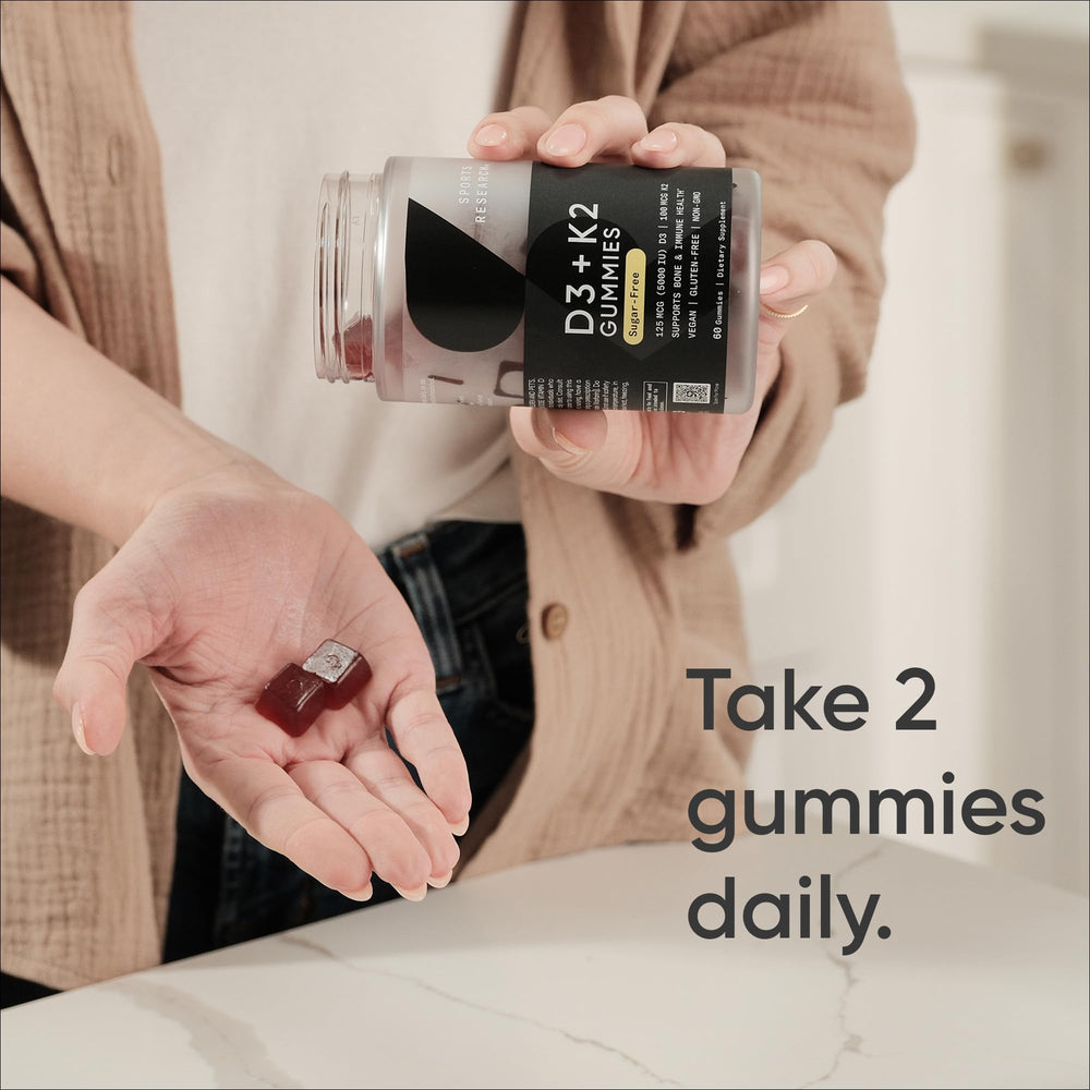 Sports Research vegan D3 K2 gummies closeup highlights chewy texture and sugar-free formula.