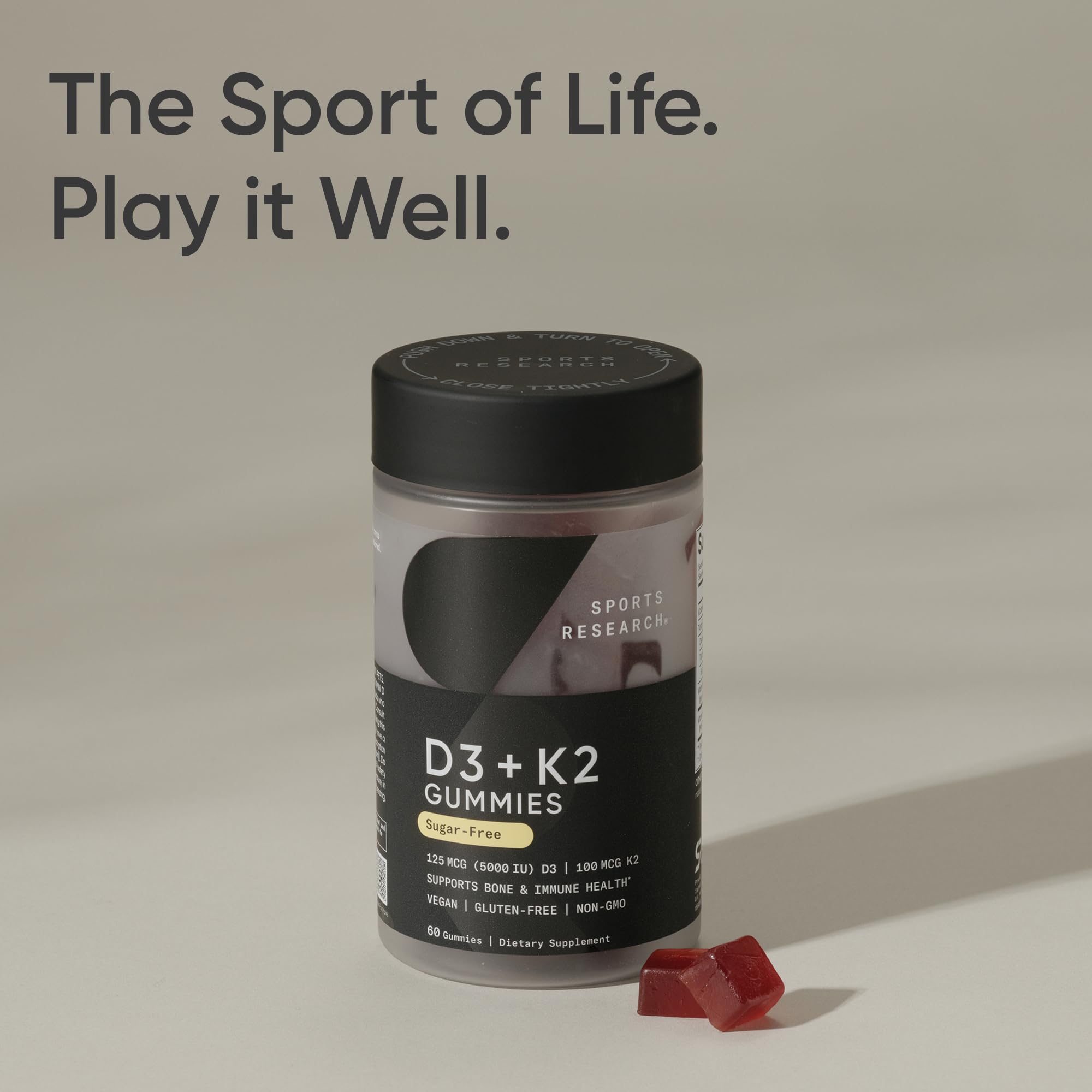 Sports Research vegan D3 K2 gummies serving angle emphasizes convenient daily bite.