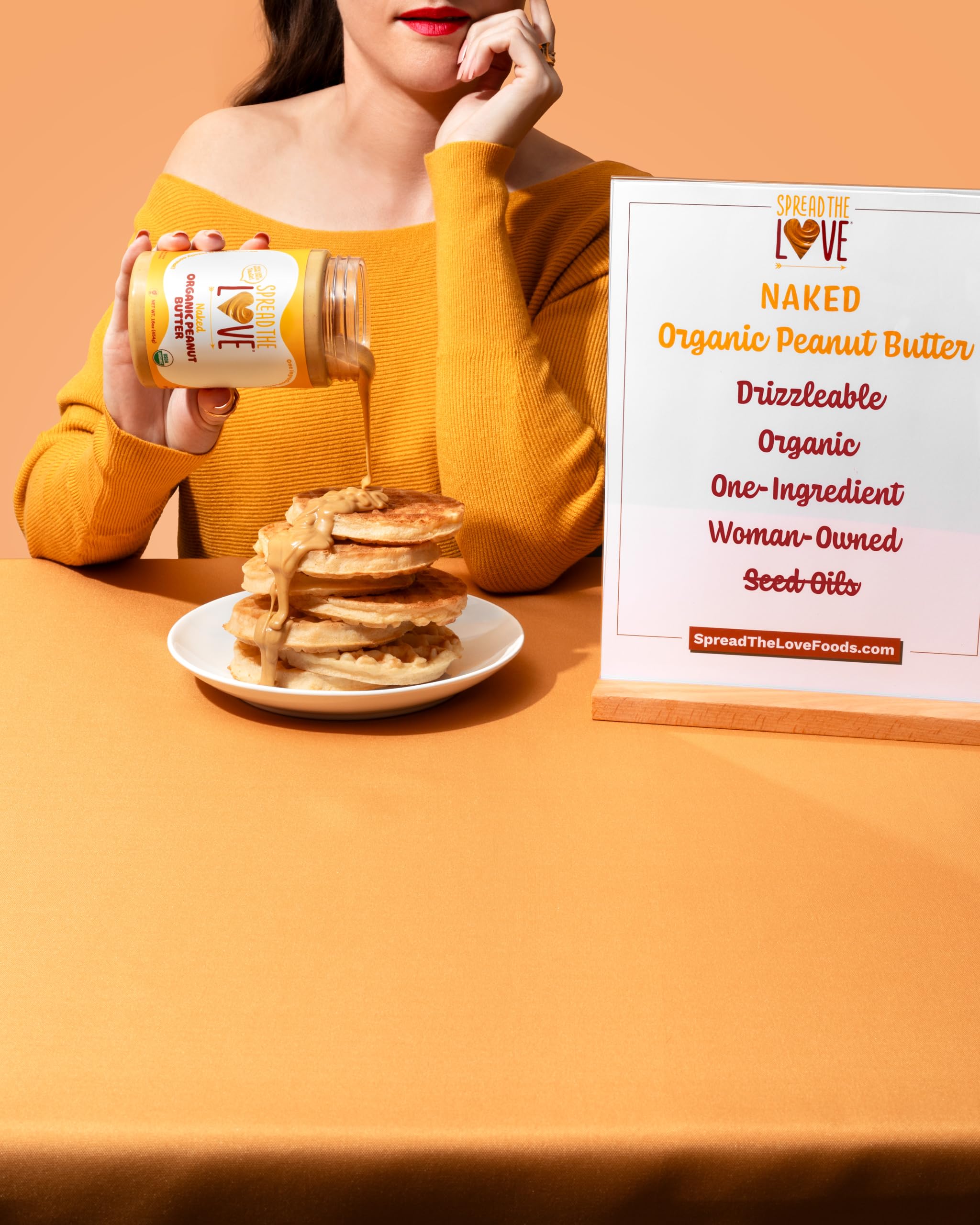 Spread The Love Naked Organic Peanut Butter small-batch USA production note.