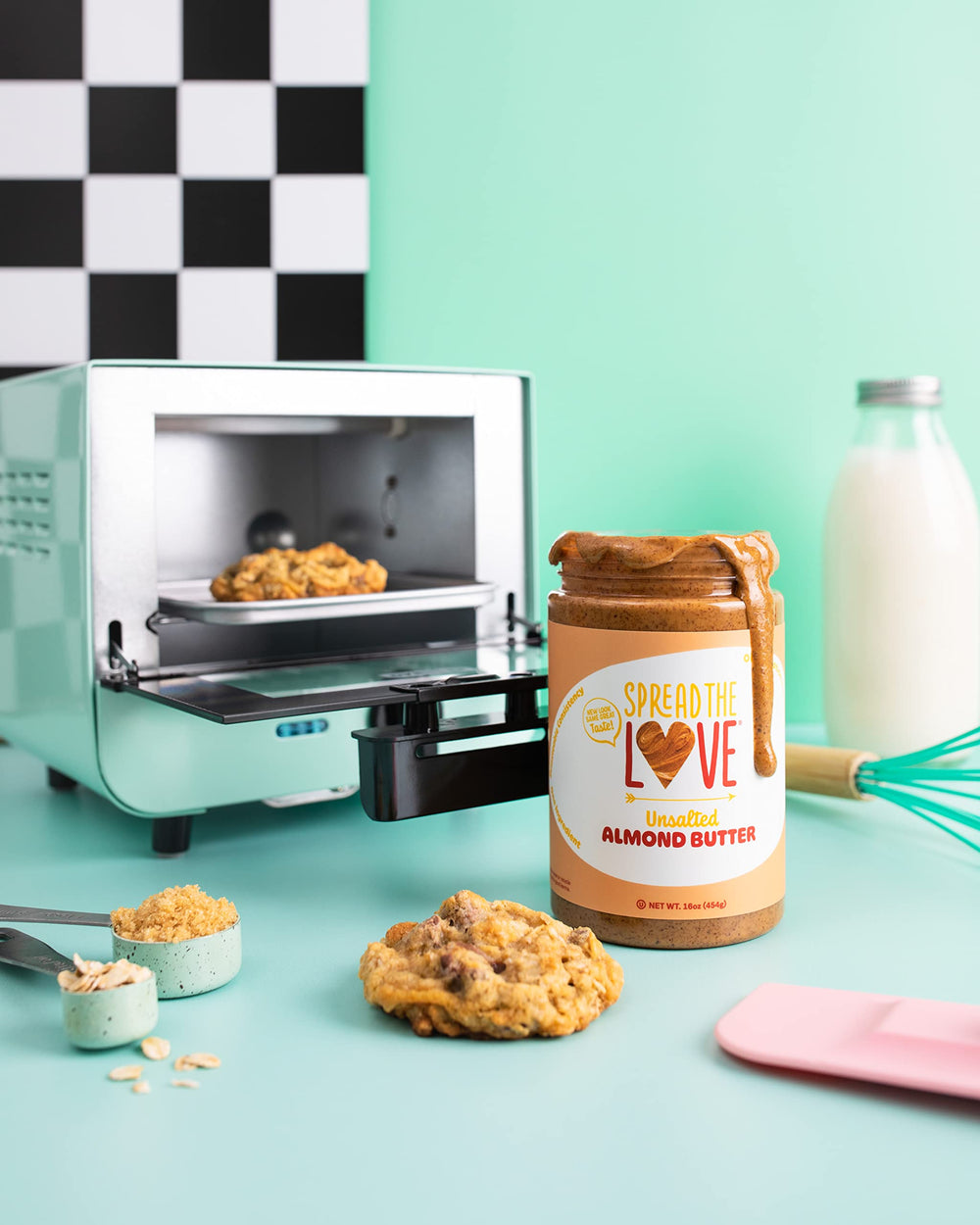 Spread The Love unsalted almond butter ingredients shot with roasted almonds.