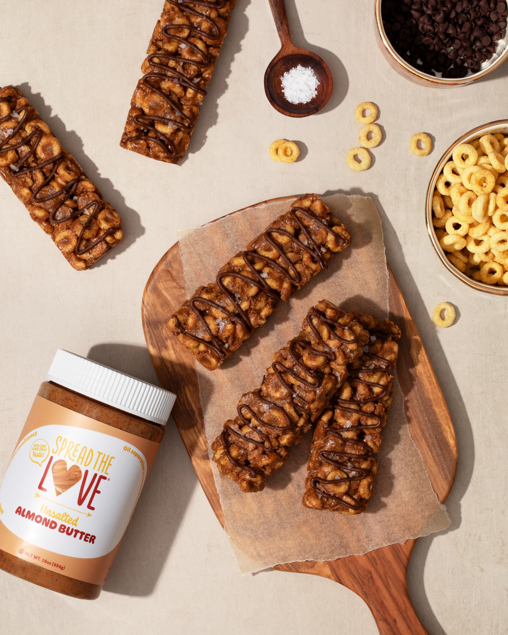 Spread The Love unsalted almond butter label close-up emphasizes quality and care.
