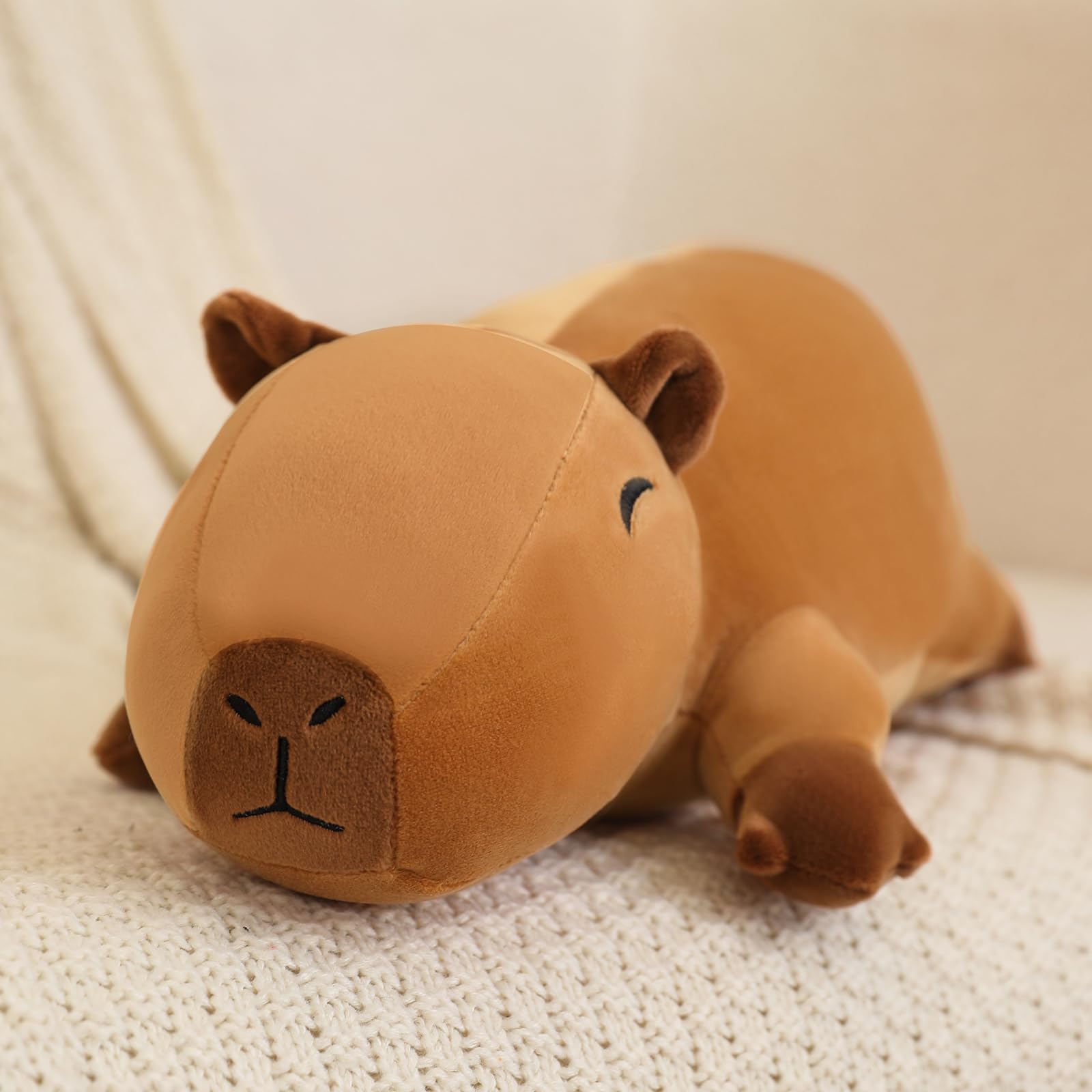 SQEQE Weighted Capybara Plush adds cozy decor and comforting presence at home.