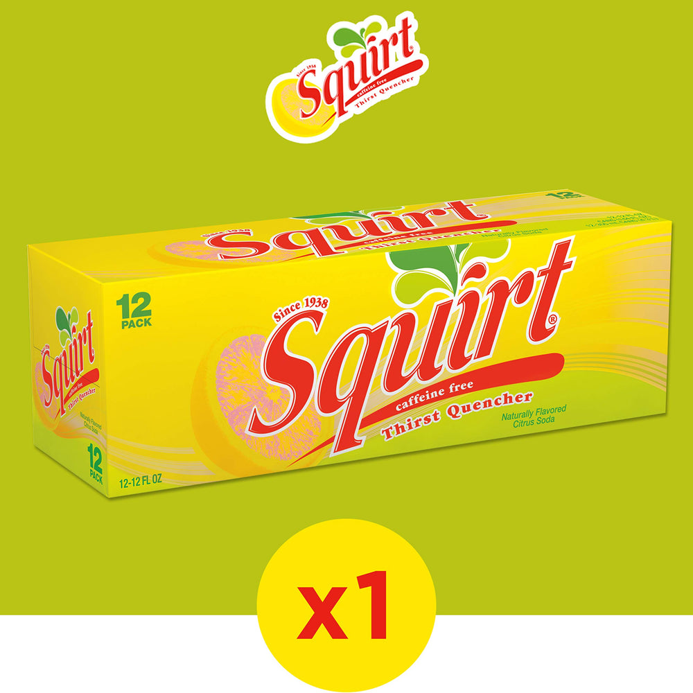 Squirt bottle pouring into a glass for a refreshing mixer