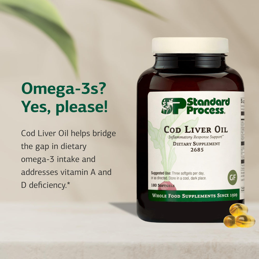 Standard Process Cod Liver Oil capsules close-up—detailed view of the omega-3 content.