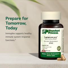 Close-up of Immuplex capsules with visible nutrient blend.