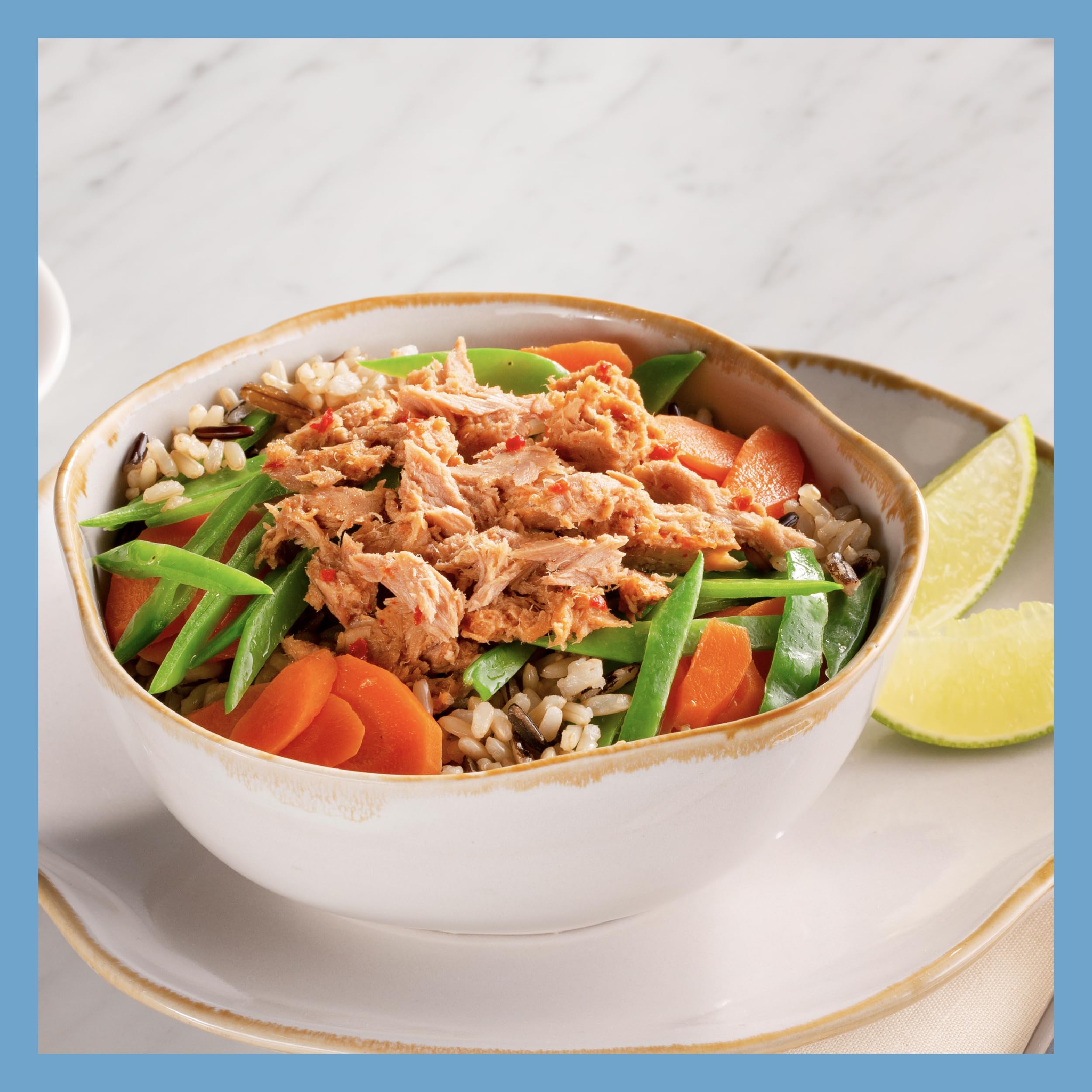 StarKist tuna pouch over a rice bowl for a simple meal.