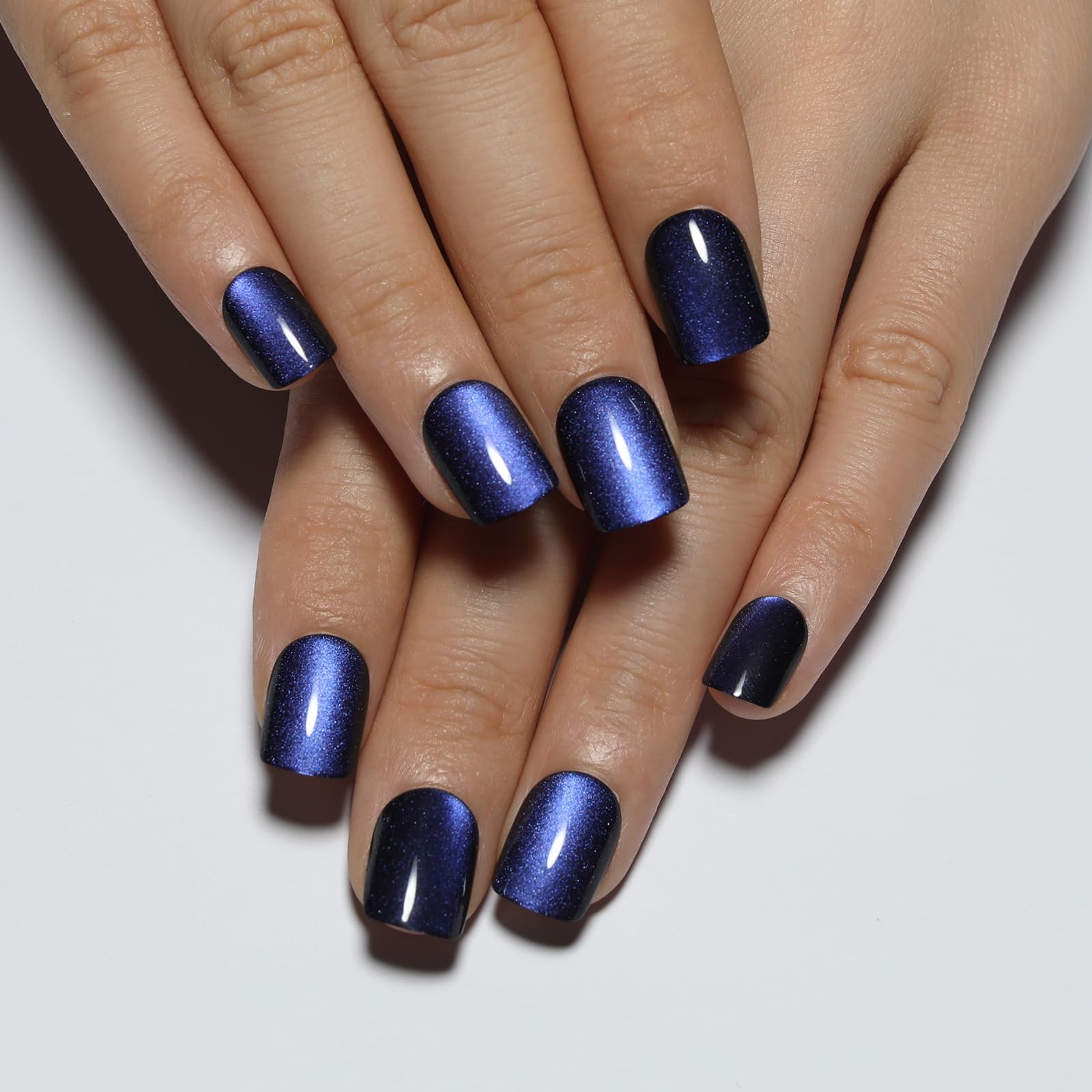 Stbisen cat-eye glow nails showing color-shifting shimmer for chic events.