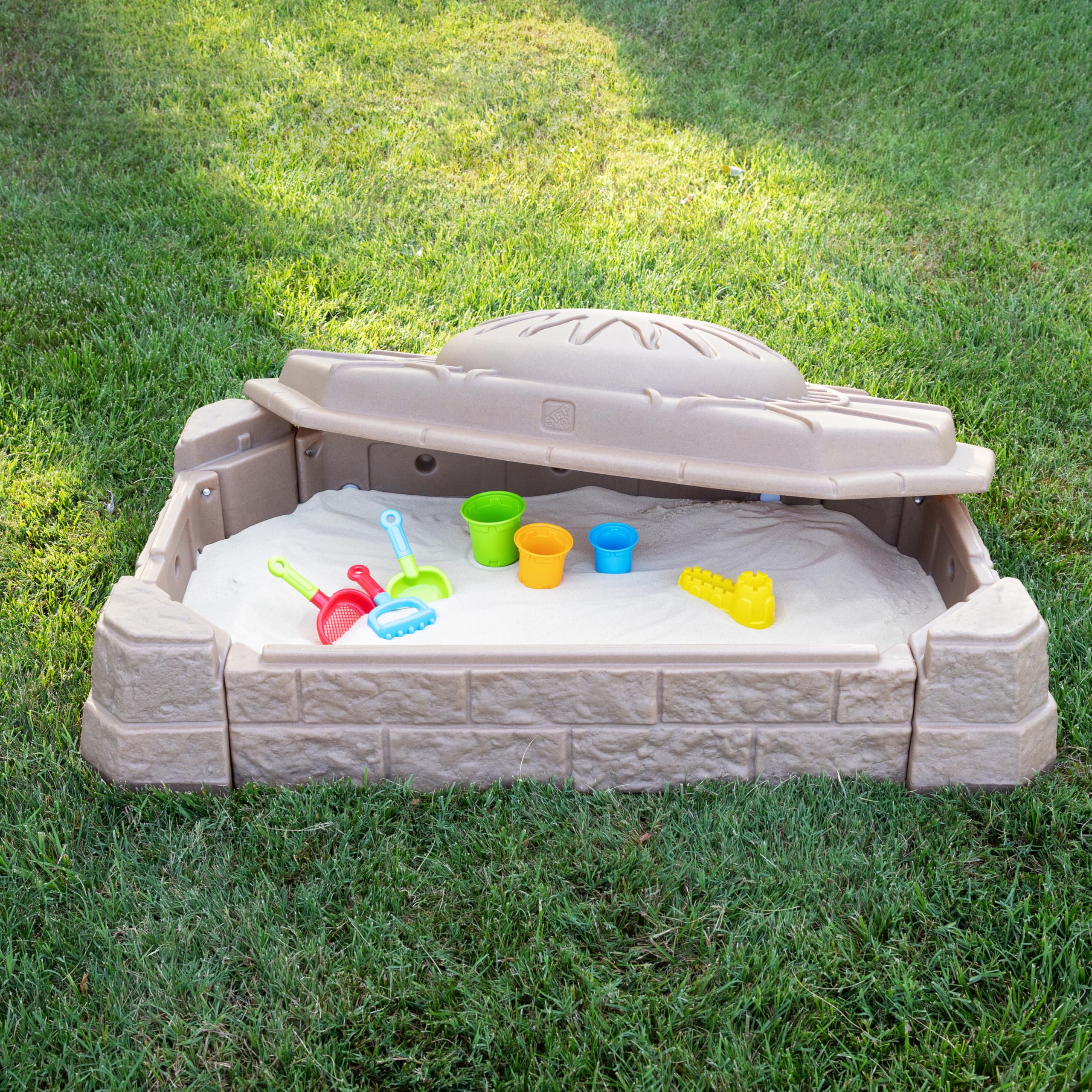 Durable double-walled plastic construction of Step2 Sandbox II.