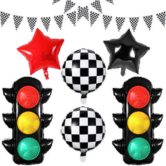 STJKRCLW race-car birthday balloons and traffic-light decor create an immersive track atmosphere for the party.