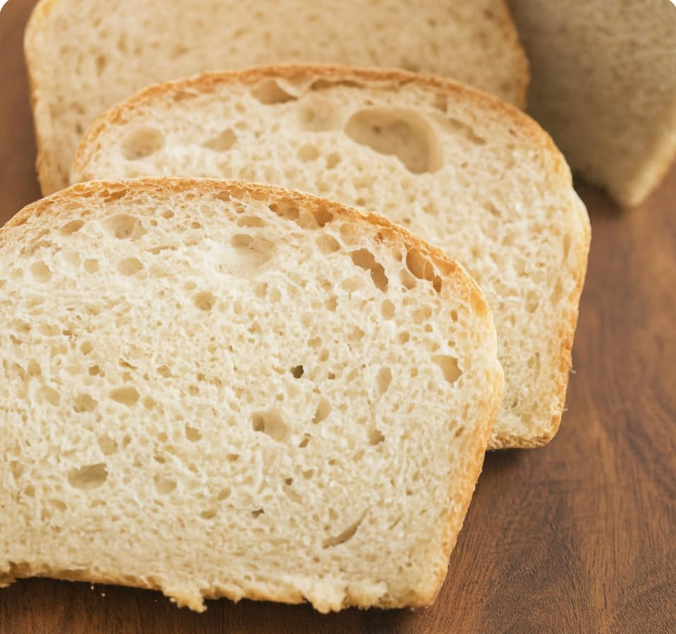 Starter in a bowl shows ready-to-bake dough texture and aroma potential.