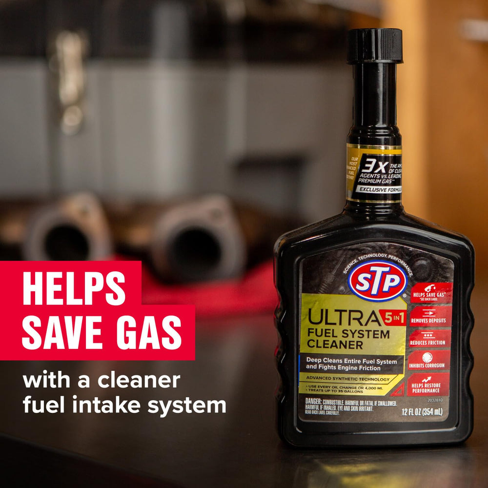 STP Ultra 5in1 bottle pour indicates in-tank treatment that may improve fuel flow.