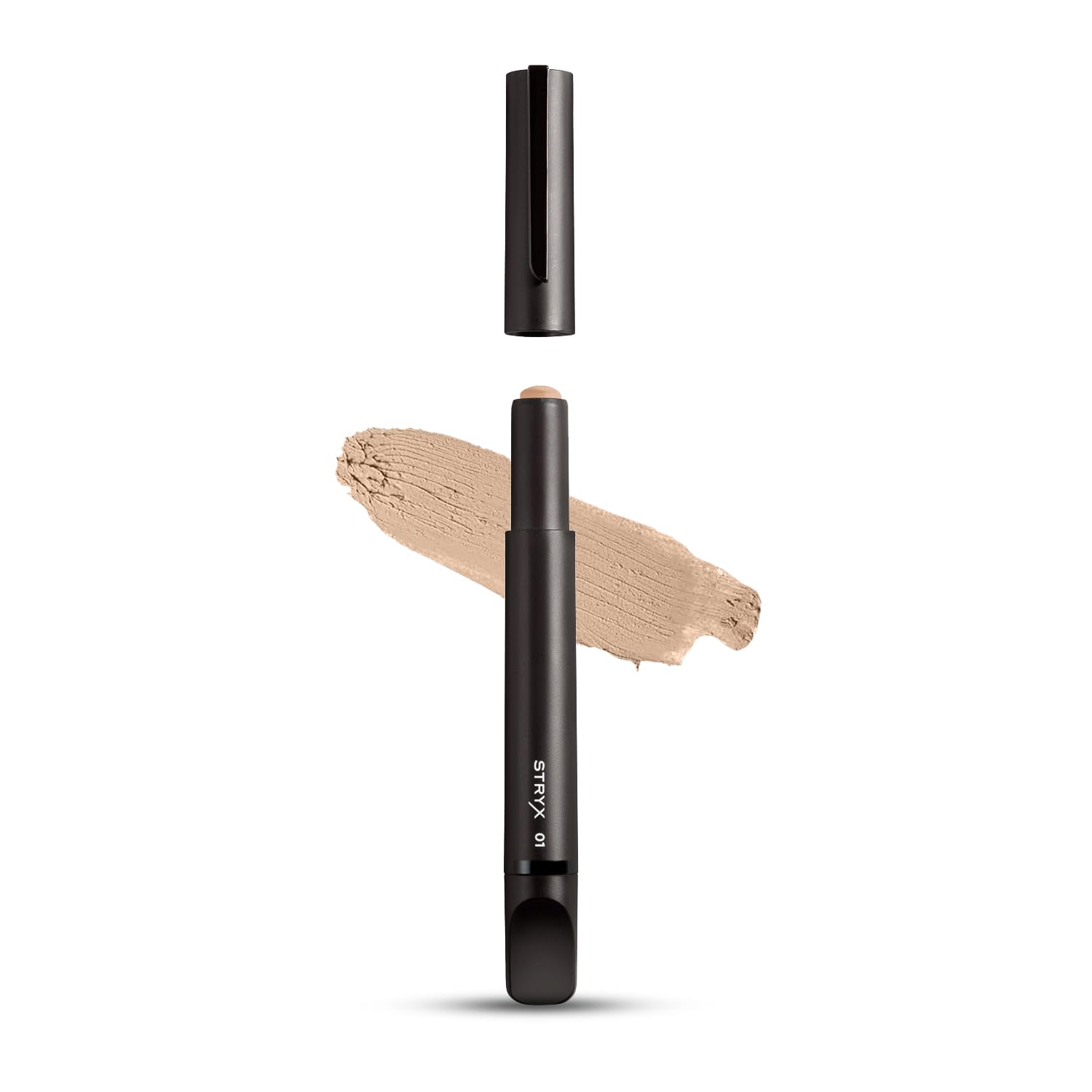 Stryx Concealer Tool in light cognac applied in hand for quick, natural concealing