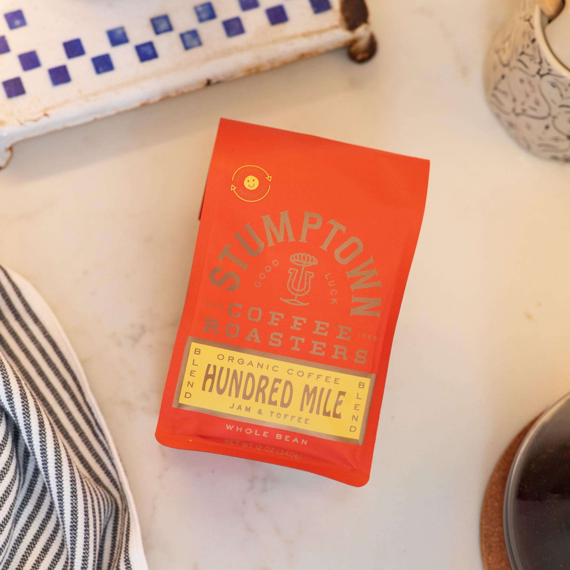 Stumptown Hundred Mile coffee beans close-up, premium Arabica for at-home freshness.