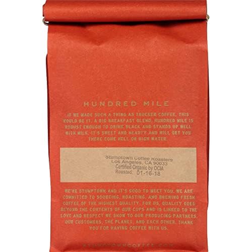Stumptown Hundred Mile bag beside a measuring spoon for precise brewing.