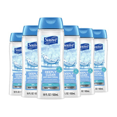 Suave Deeply Clean antibacterial body wash bottle being poured for a refreshing cleanse.
