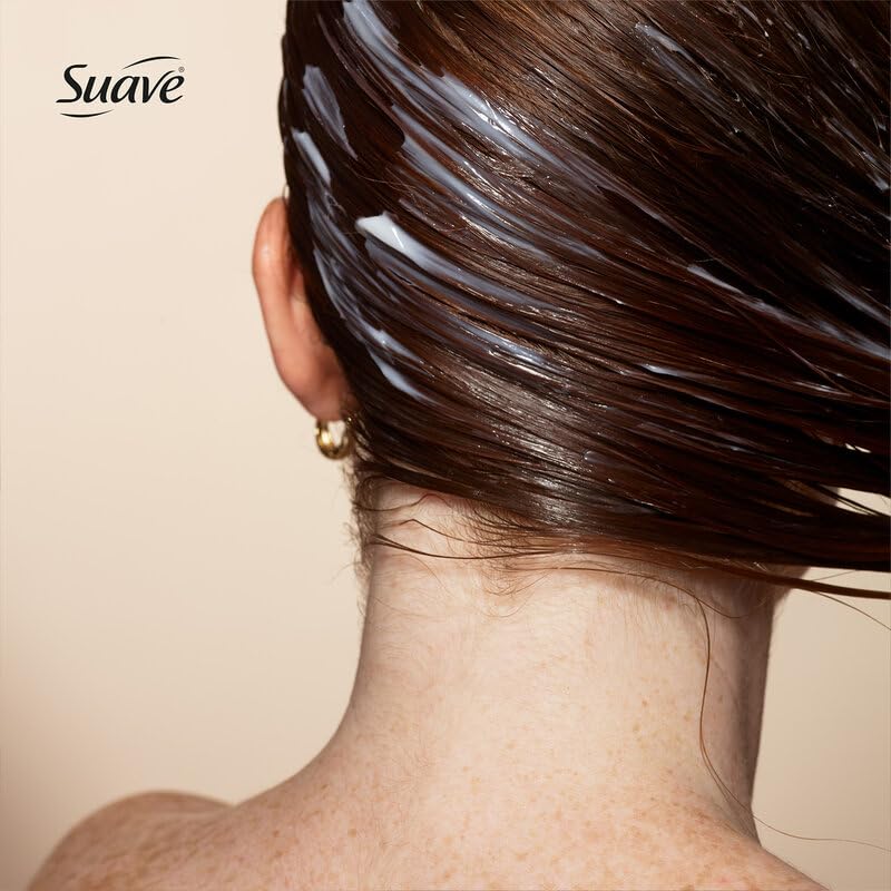 Conditioner pour on hair from Suave bottle delivering deep conditioning