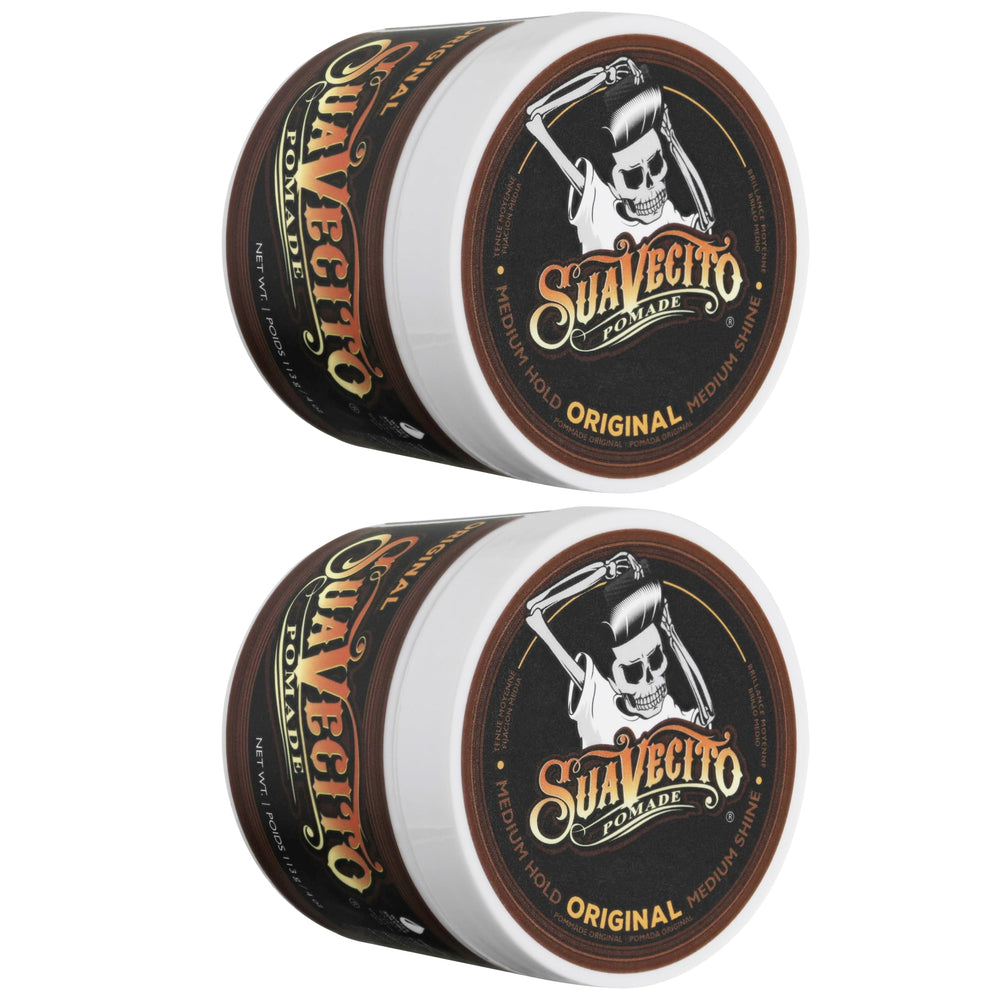 Hands scoop Suavecito Pomade Original for precise, even styling.