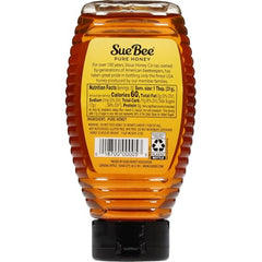 Label closeup highlighting USA origin and Grade A quality of Sue Bee honey.