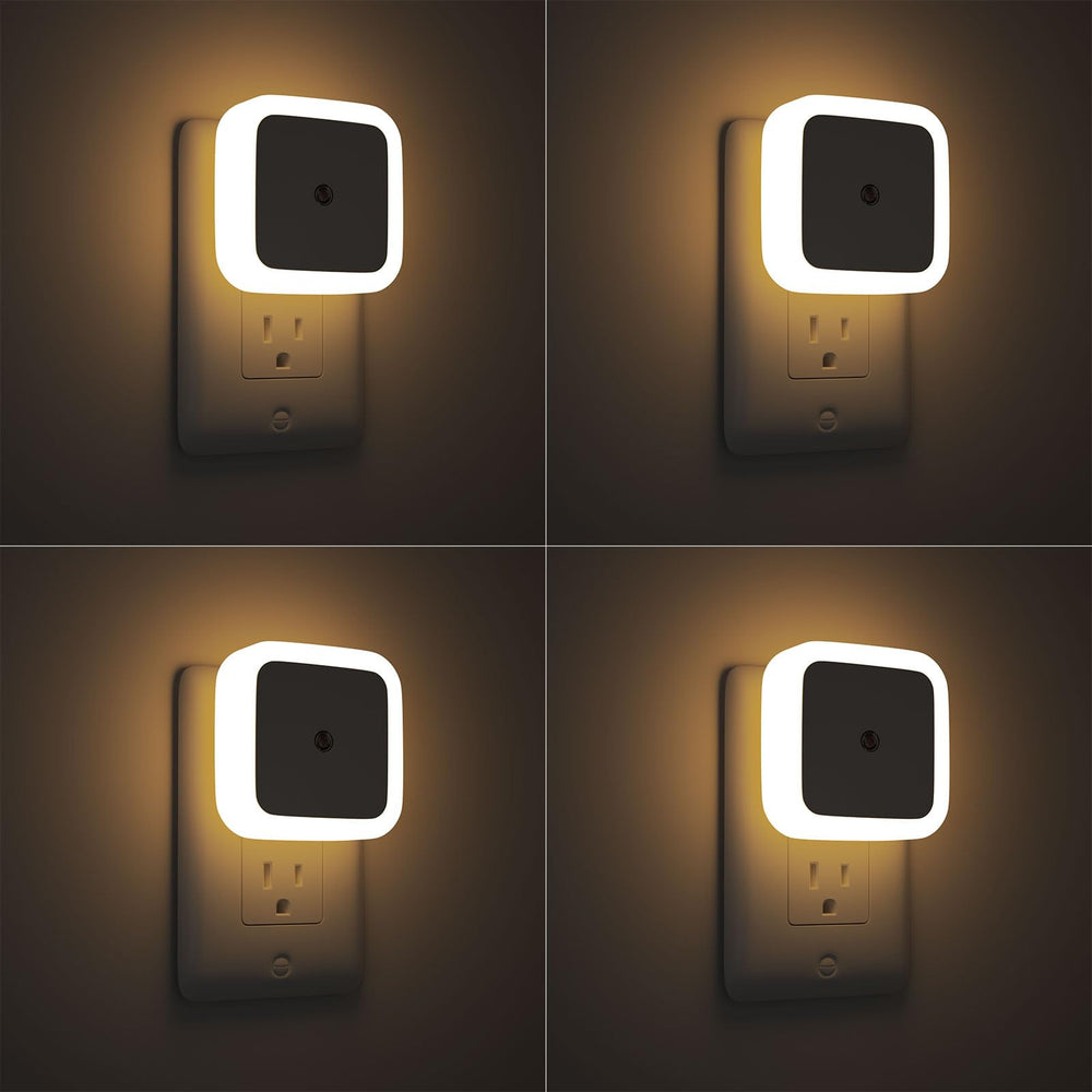 Sujeet Night Light 4-pack plugged in to wall outlet for soft hallway illumination