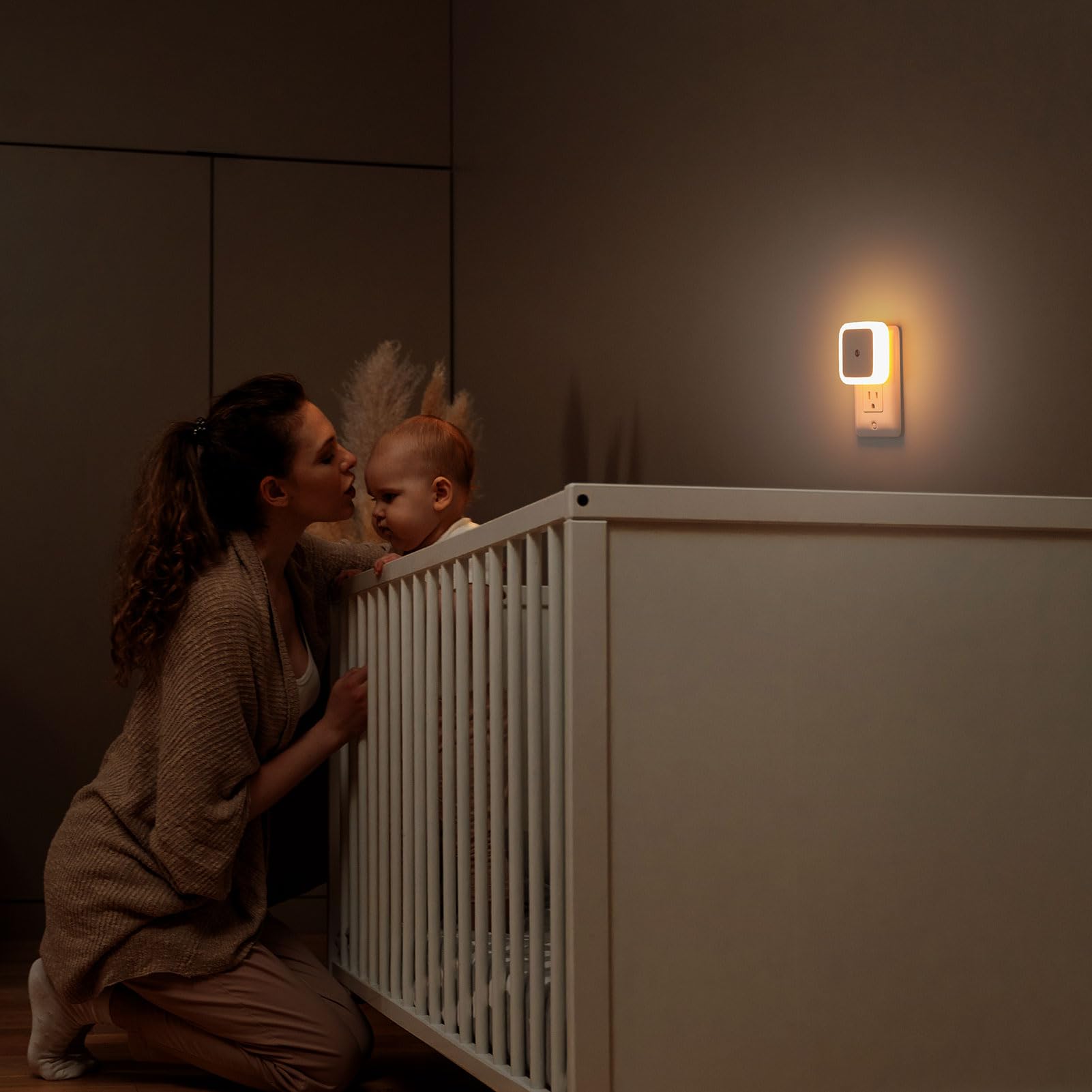 Sujeet Night Light plugs into an outlet while keeping space for another device.