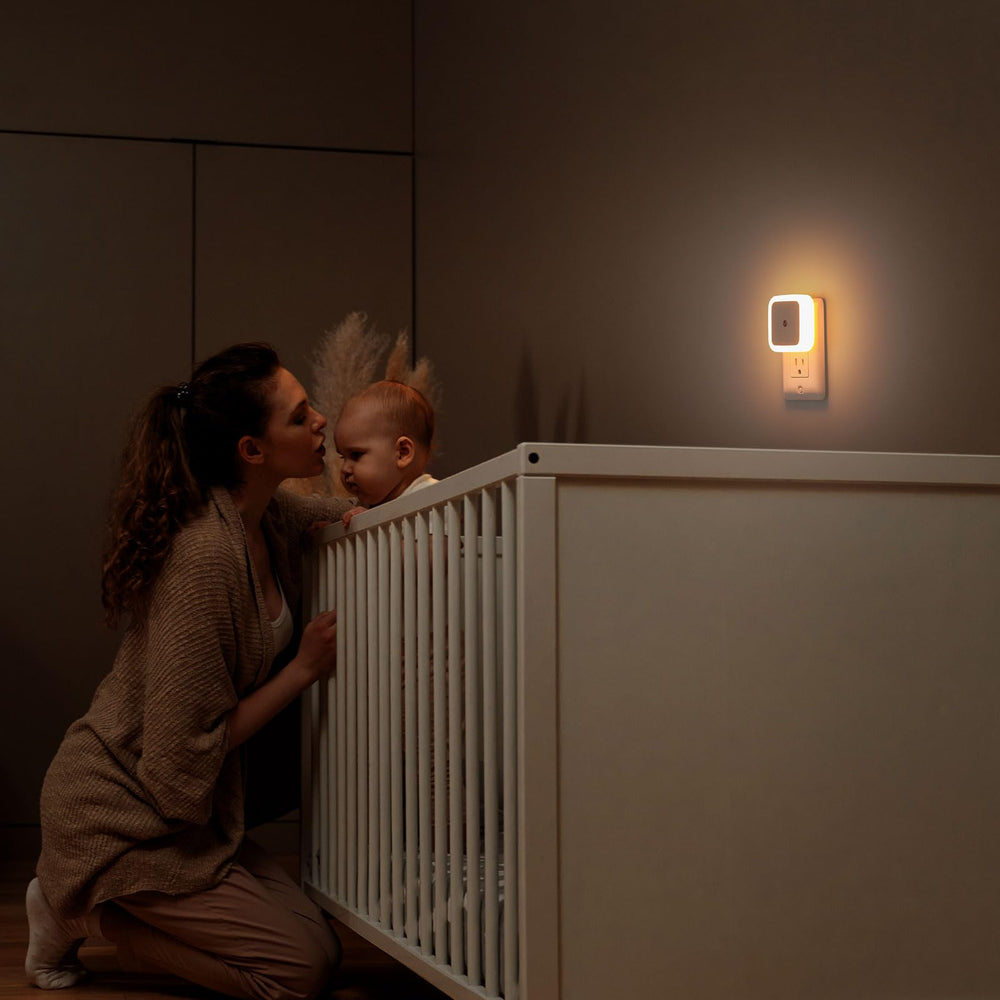 Sujeet Night Light plugs into an outlet while keeping space for another device.