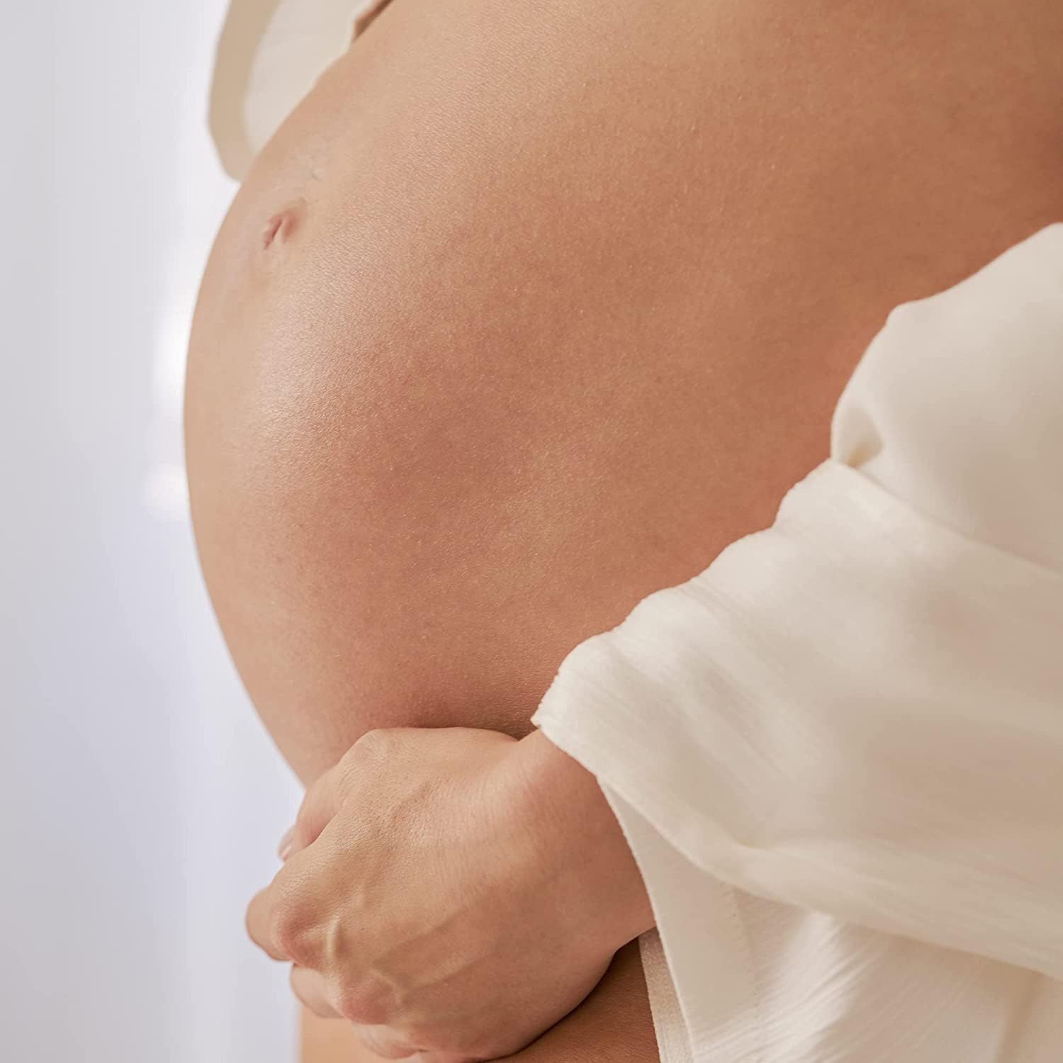 Stretch marks care with Summer Fridays Babymoon Belly Balm for comfort.