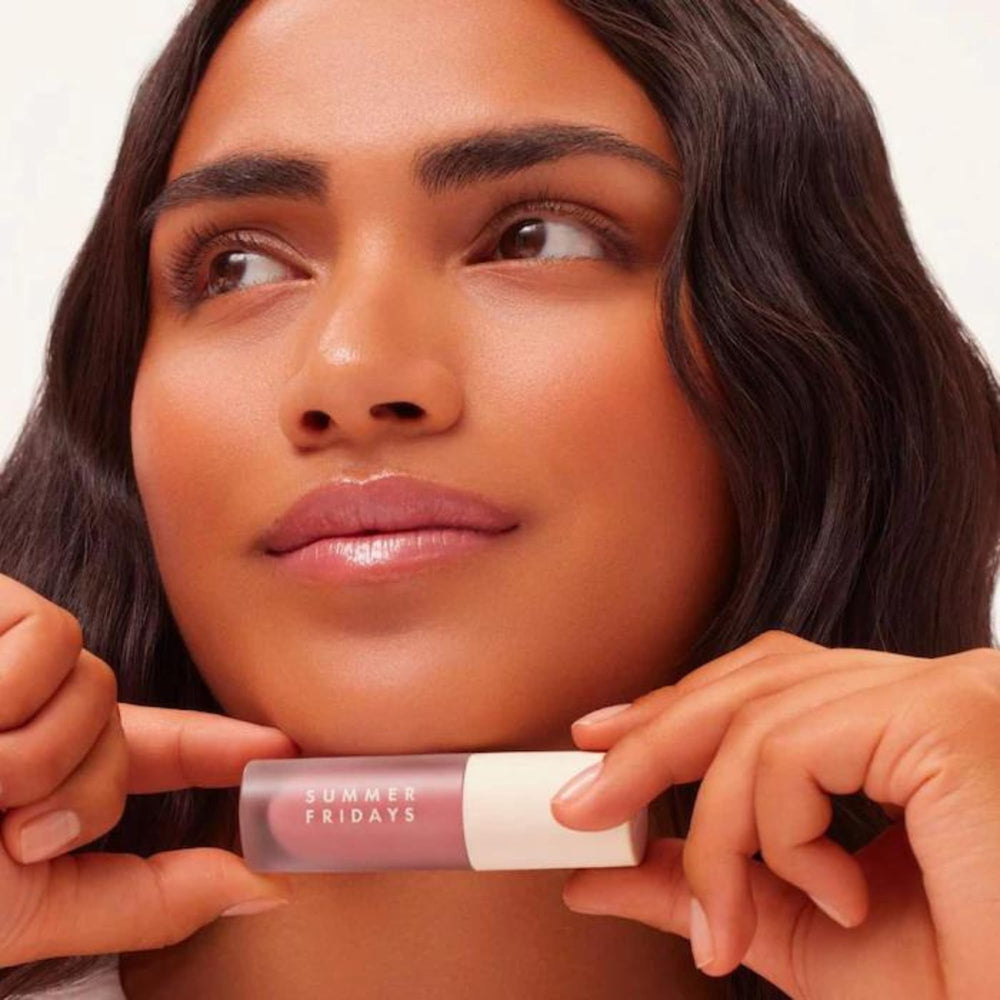Summer Fridays Dream Lip Oil applicator gliding for a smooth non-sticky finish