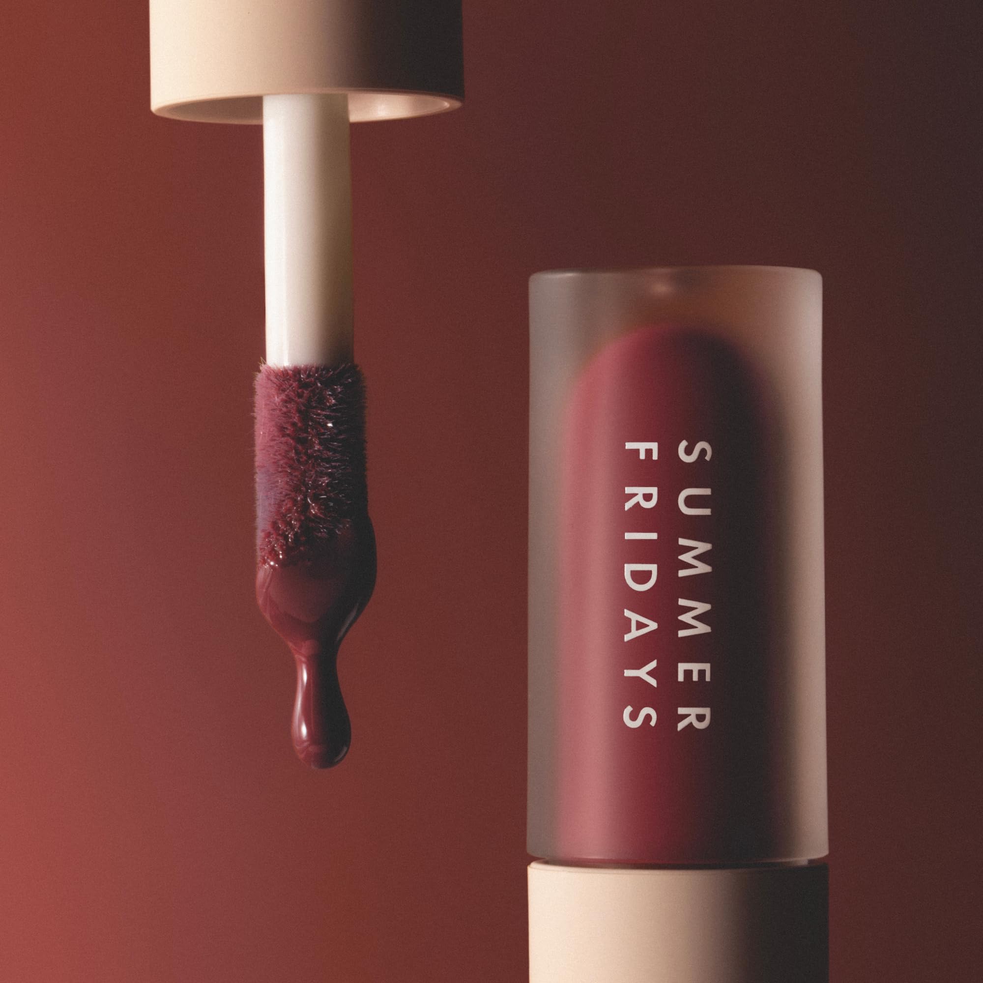 Summer Fridays Dream Lip Oil lifestyle shot with hydration and glow.