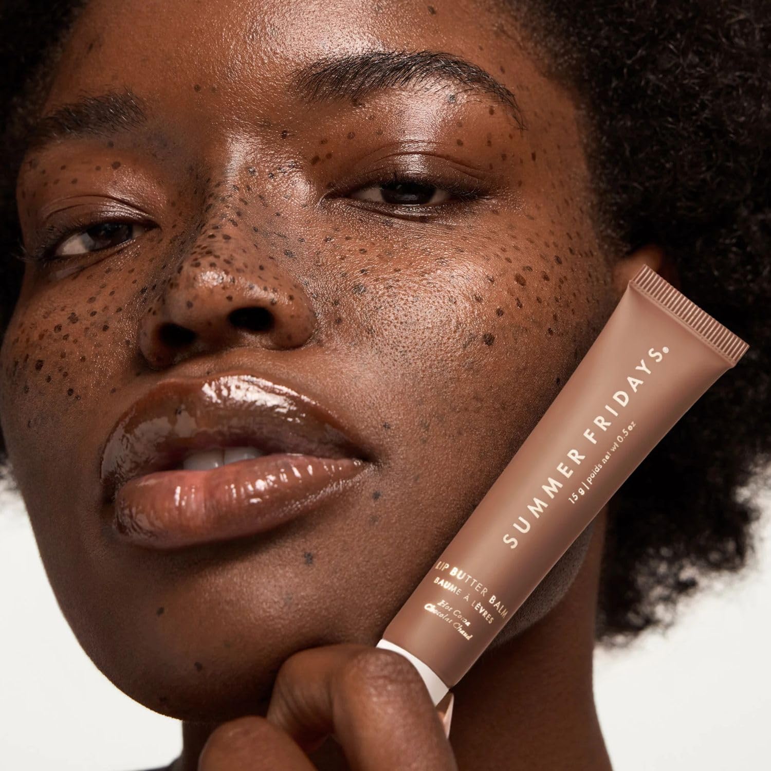 Lip balm on dry lips from Summer Fridays provides instant hydration.