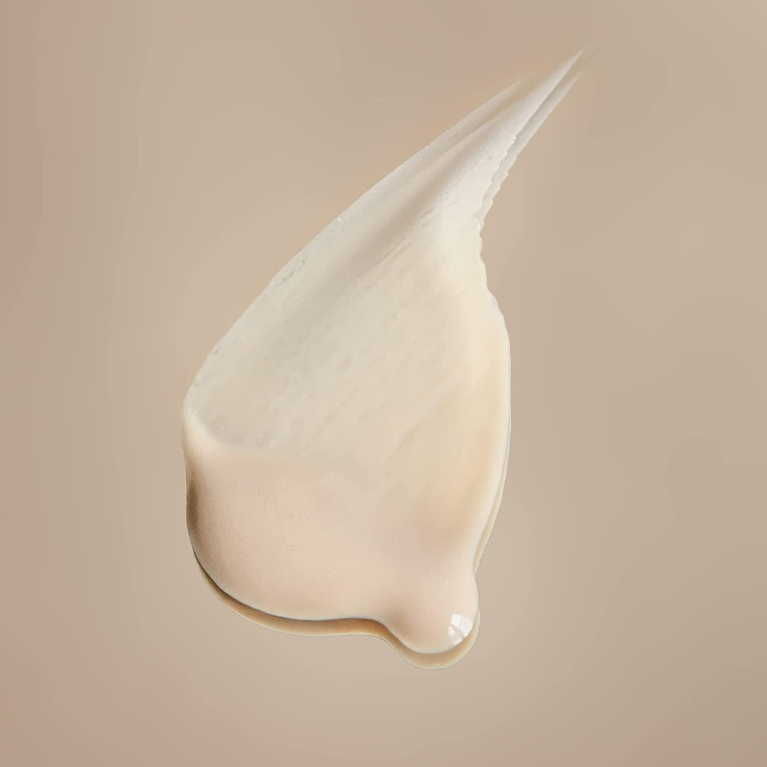 ShadeDrops swatch on hand reveals milky texture and blendable coverage