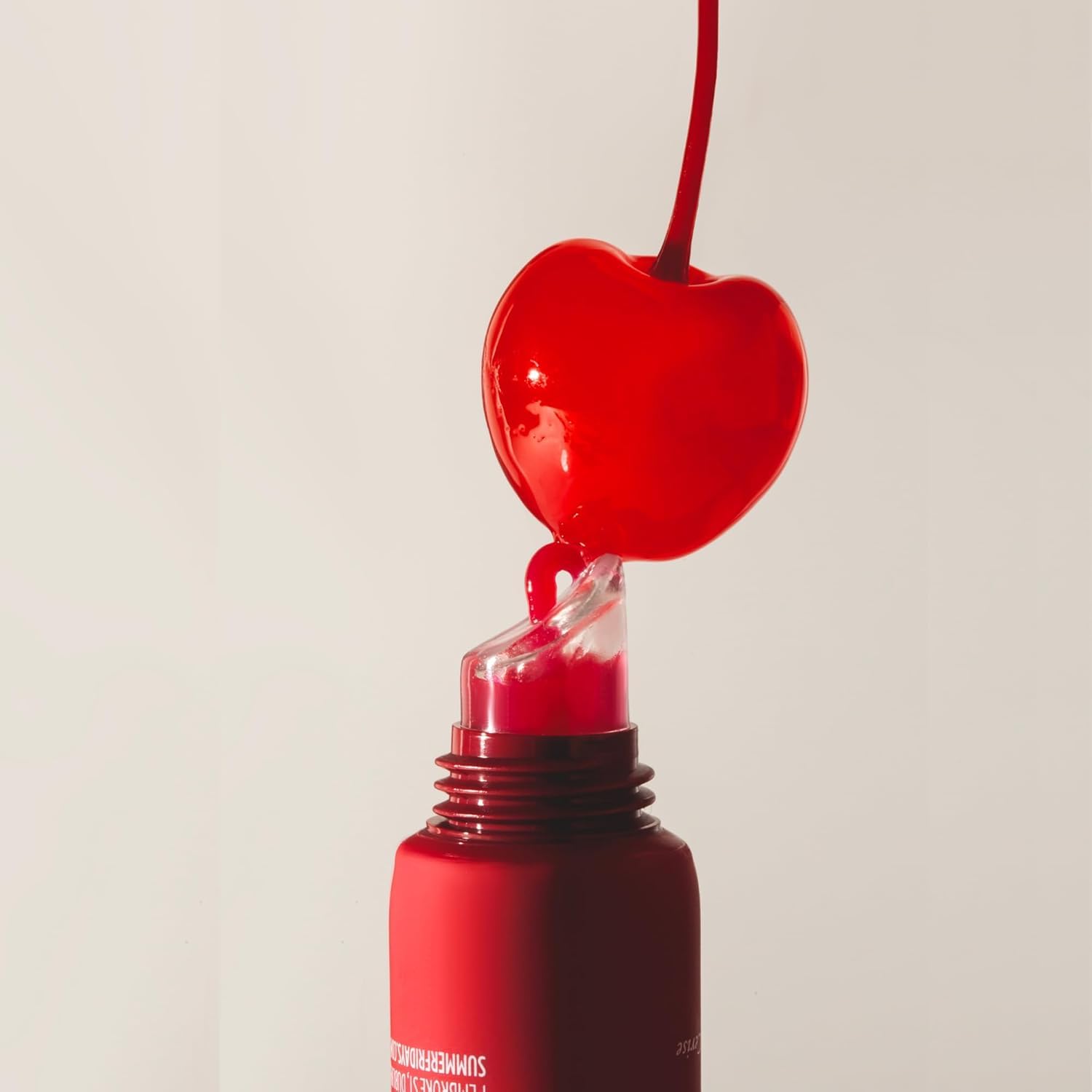 Travel-friendly compact of Summer Fridays Cherry lip balm