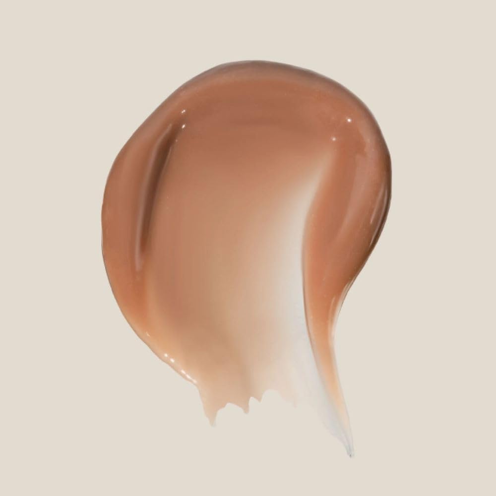 Summer Fridays tinted lip butter closeup swirl highlights sheer cocoa tint for daily wear.