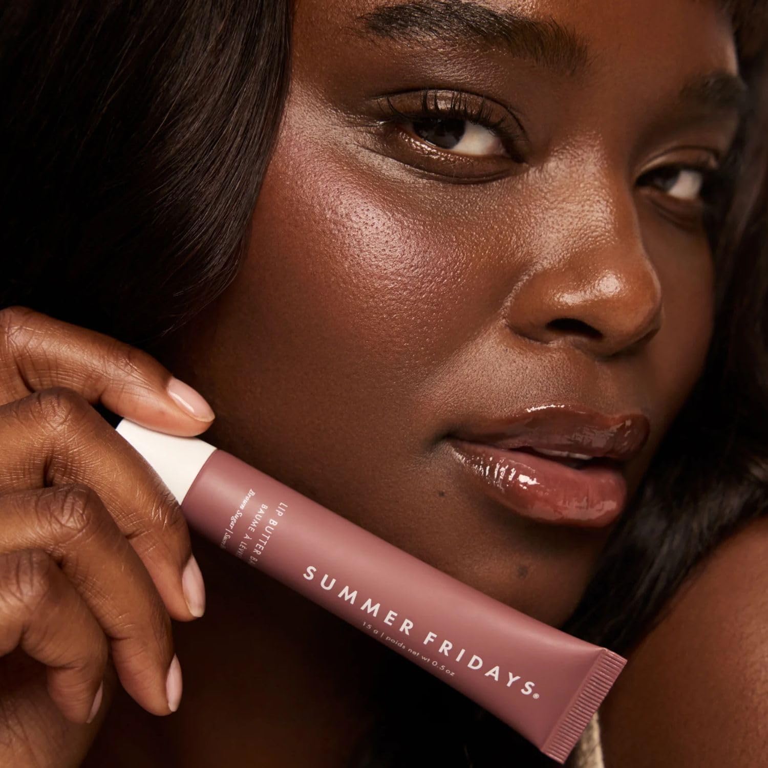 Summer Fridays balm is easy to apply under or over lipstick.