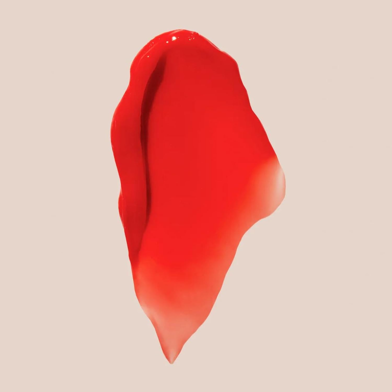 Summer Fridays Tinted Lip Butter Poppy swatch shows sheer color with instant shine