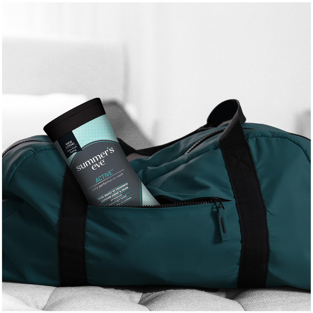 Side view of Summer’s Eve Active daily wash bottle shows design and balanced formula for intimate care.