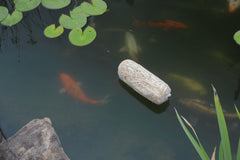 Fountain and pond setup with barley straw treatment by Summit for natural filtration.